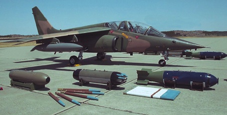 The venerable Alpha Jet trainer and light attack aircraft carries a variety of internal and external weapons for air-to-air and air-to-ground roles manufactured and supported by ORDTECH. Extract from the aircraft manual relevant pages is depicted for reference. The list includes the 30mm DEFA canons, Mk80 series and other types of bombs. The Alpha Jet is fully certified and cleared to carry and launch both 68 mm and standard NATO caliber 2.75” inch (70 mm) ones. ORDTECH 2.75” launchers include the 19 tube OMI-LAU-61. The use of the 2.75” weapon system is immediately interchangeable in terms of hard-points, wiring, armament panel and ultimately operational use. Rockets (and Launchers) 2.75” offer distinct advantages over the 68 mm: -1- Performance : is superior in terms of range and accuracy (especially with the latest type of motor Mk66 which is of Wrap Around Fin type). Additionally the 2.75” warheads family is larger (more types) and includes precision guided (Laser) types for more complex missions. -2- Economy : Significant cost reduction in the aircraft life cycle. Rockets 2.75” (motors and warheads) are between 4X less expensive than the 68 mm cost) and between 4X to 7X less expensive (25% to 15%) for the launchers. The 2.75” launchers include an additional tube (19 vs 18).